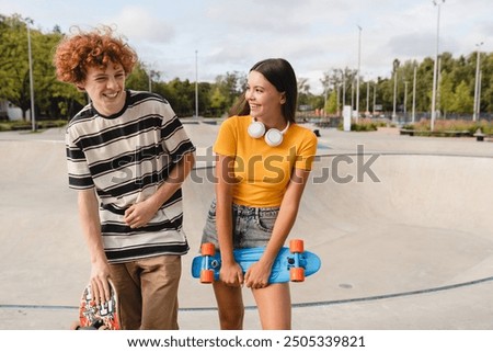 Similar – Image, Stock Photo Hipster teenage couple bonding on field in sunlight