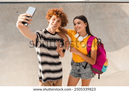 Similar – Image, Stock Photo Hipster teenage couple bonding on field in sunlight