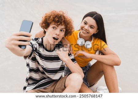 Similar – Image, Stock Photo Hipster teenage couple bonding on field in sunlight