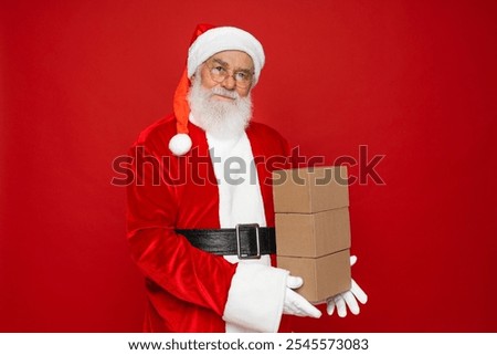 Image, Stock Photo woman in a Santa hat with lighted sparklers on the background of a New Year or Christmas tree decorated with red ball.