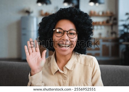 Similar – Image, Stock Photo Woman making a video call while greeting