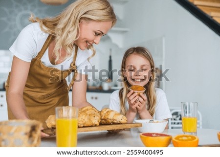 Similar – Image, Stock Photo Two schoolgirls spending time in school library. Primary school students learning from books. Children having fun in school club. Doing homework