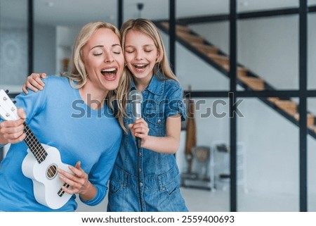 Similar – Image, Stock Photo Mother and cute little son hugging outdoors