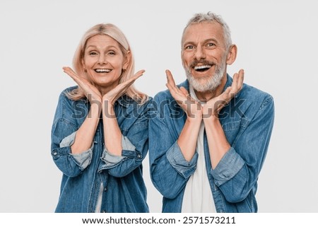 Similar – Image, Stock Photo Blonde woman wearing denim shirt and black leather skirt sitting in an urban bench.