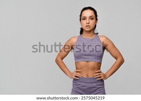 Similar – Image, Stock Photo Strong sportswoman jumping over sandy hill