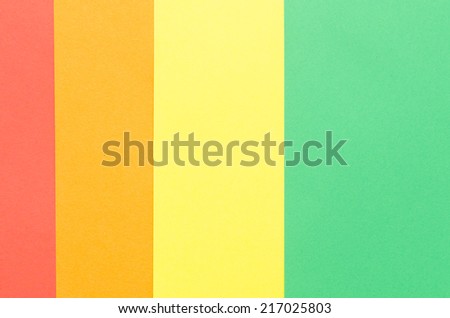 colored construction paper sheets arranged in vertical stripes