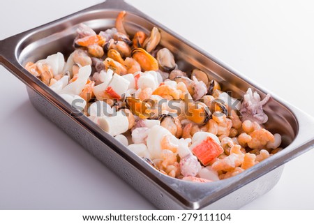 Mixed frozen seafood in chafing-dish
