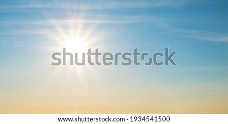 beautiful setting sun and blue sky with copy space.