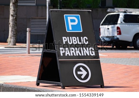 View of public parking sandwich board Stock fotó © 