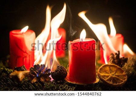 Similar – Image, Stock Photo advent wreath with burning red candles standing on wooden table in living room with candle arch in window