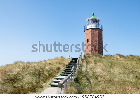 Similar – Foto Bild Rotes Kliff an der Küste der Insel Sylt bei Sonnenuntergang.  Leere Strandkulisse an der Nordsee