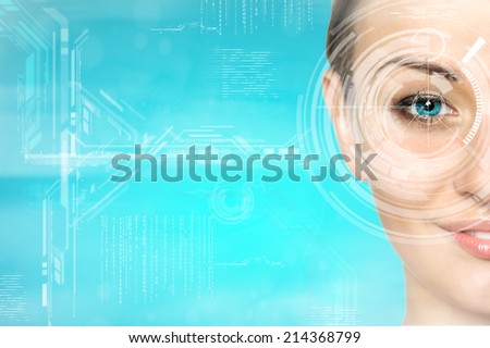 portrait of young and beautiful woman with the virtual hologram on her eyes (laser medicine and security technology concept)