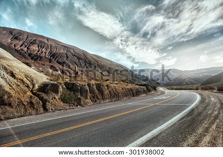 Cinematic road landscape. Humahuaca valley, Altiplano, Argentina. Misty road. Mist.