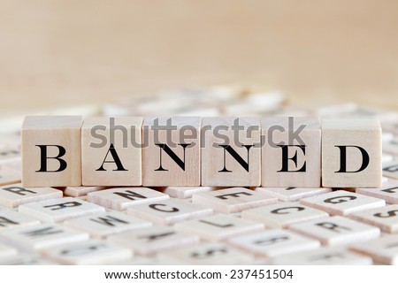 banned word background on wood blocks