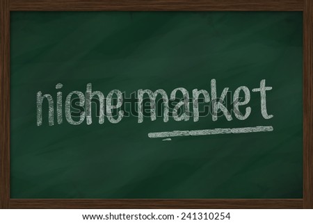 niche market word on chalkboard