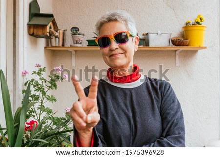 Similar – Image, Stock Photo rainbow flag on grey facade