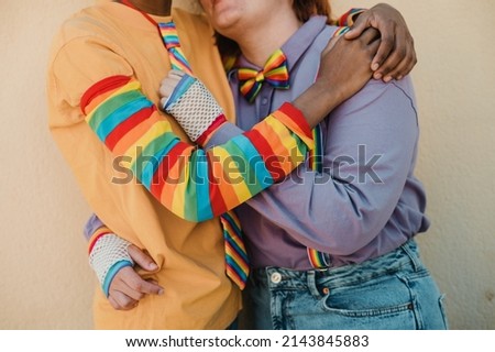 Similar – Image, Stock Photo Anonymous tender homosexual couple hugging on street