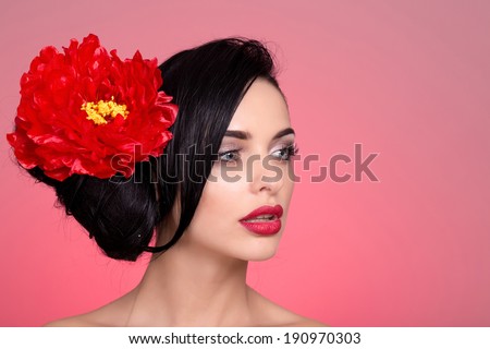 Beauty Portrait. Beautiful Stylish Girl with rose Flower. Perfect Face Skin