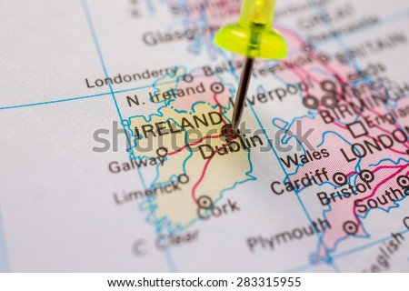 travel destination, pin on the map. Ireland on atlas world map