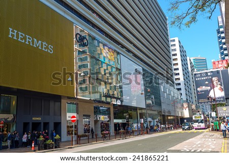 HONG KONG, CHINA - January 4 2015 : Canton Road, Tsim Sha Tsui is a luxury brands shopping street in Hong Kong. Hermes, Salvatore Ferragamo and Chanel are opened the flagship stores at Canton Road.