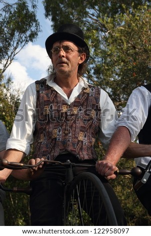 BRISBANE, AUSTRALIA - NOVEMBER 24 : Unidentified participant in penny farthing stack world record attempt on November 24, 2012 in Brisbane, Australia