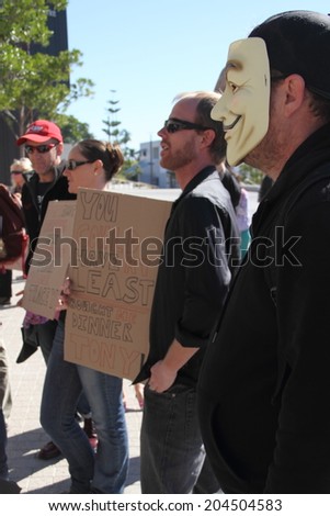 BRISBANE, AUSTRALIA - JULY 12 : Unidentified protesters outside Liberal National Party national conference July 12, 2014 in Brisbane, Australia
