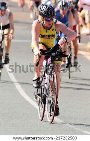 MOOLOOLABA, AUSTRALIA - SEPTEMBER 14 : Unidentified participant in cycle leg of sunshine coast triathlon on September 14, 2014 in Mooloolaba, Australia