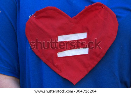 BRISBANE, AUSTRALIA - AUGUST 8 2015:Equal love heart shirt at Marriage Equality Rally August 8, 2015 in Brisbane, Australia