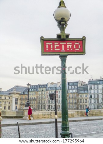 PARIS, FRANCE - DECEMBER 17, 2013: Metro sign in Ile de la Cite (Island of the City) in Paris France