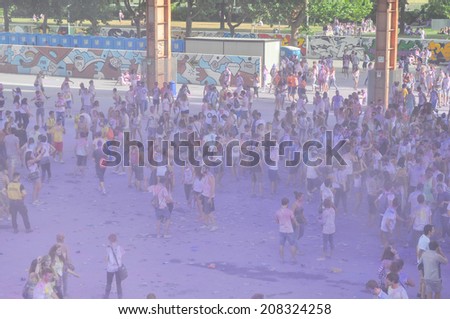 TURIN, ITALY - JULY 12, 2014: Young people attending a rave party at Holi Fusion Indian festival in Parco Dora park