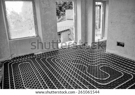 Underfloor heating and cooling indoor climate control for thermal comfort using conduction radiation and convection in black and white