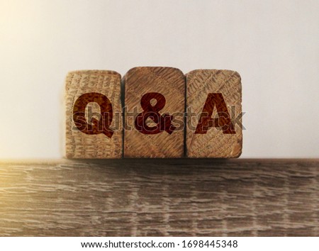 Close-up Shot of Q and A wooden blocks. Customer supprot questions and answers concept. Stock foto © 