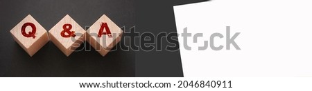 Q and A on wooden blocks Close-up Shot . Question and answers support center business concept Stock foto © 