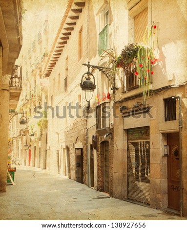 Empty alleyway in Barcelona,  Spain. Carrer de les sitges street . Photo in retro style. Paper texture.