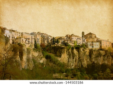 Retro image  of Hanging Houses in the medieval town of Cuenca, in Castilla La Mancha, Spain. paper texture