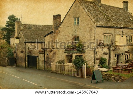 small cafe in Bibury, Gloucestershire, England.  Photo in retro style. Paper texture.