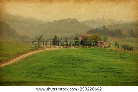 Typical tuscan  farm, Italy.  Added paper texture. Photo in retro style.