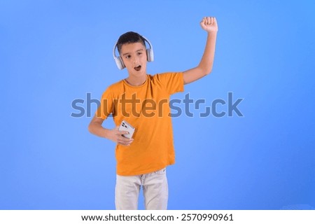 Similar – Image, Stock Photo Cheerful boy holding colorful kite