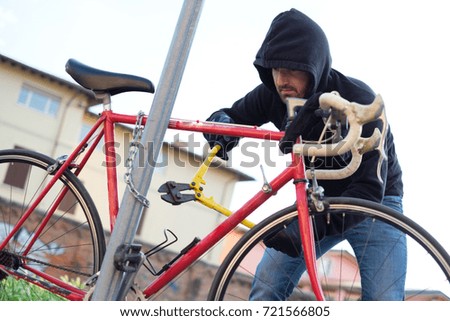 Similar – Foto Bild ein abgestelltes abgeschlossenes Fahrrad