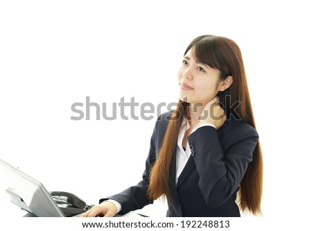 The female office worker who is troubled with stiff shoulder
