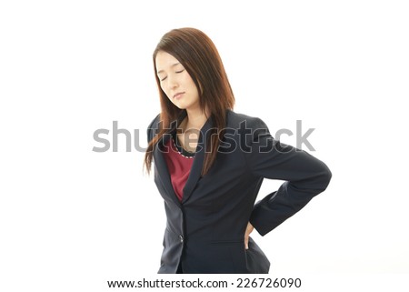 Business woman with low back pain