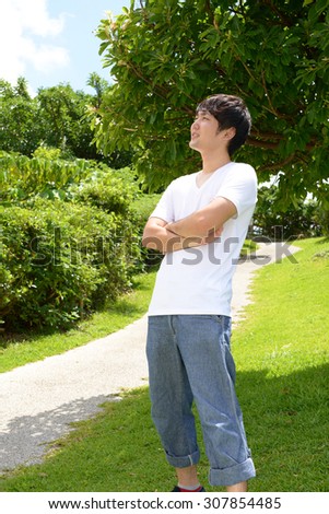 Relaxed young man at the park