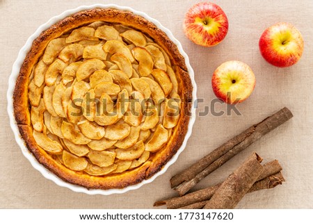 Similar – Image, Stock Photo Traditional french apple tart over brown planks