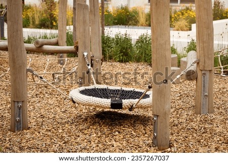 Similar – Foto Bild Schaukel auf Kinderspielplatz