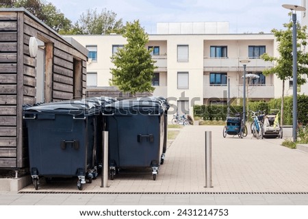 Similar – Image, Stock Photo Garbage cans in front of apartment building