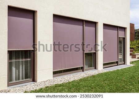 Similar – Foto Bild Fassade mit geschlossenen Jalousien