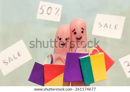 Finger art of a Happy couple with shopping bags