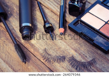 Cosmetics for eyes: pencil, mascara, eyeliner, false eyelashes