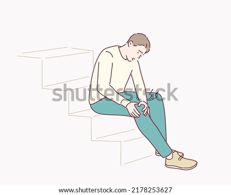man holding his leg with both hands, feeling pain in knee or calf, massaging it. Hand drawn style vector design illustrations.