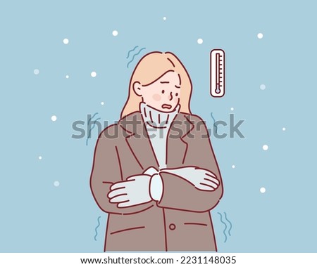 Woman shivering from cold weather.  Hand drawn style vector design illustrations.